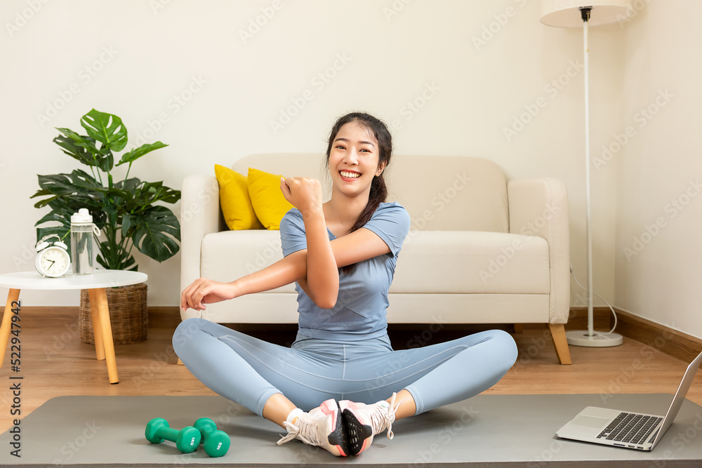 Healthy lifestyle young woman warm before exercise fitness gym for body slim at living room on line. Young people girl fitness gym for body slim Healthy lifestyle young woman warm before exercise fitness gym for body slim at living room on line. Young people girl fitness gym for body slim