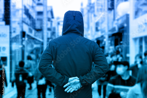 Anonymous man in a black hoodie.
