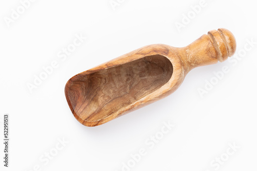 Scoop with wheat grains and spikelets on white background.