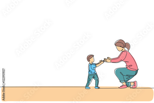 Single continuous line drawing of young mom ready to hug her son who learned to walk towards her at home, happy parenting. Family loving care concept. Trendy one line draw design vector illustration