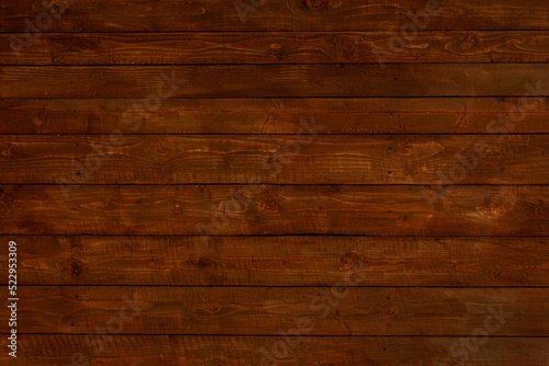 dark brown wood background made of planks