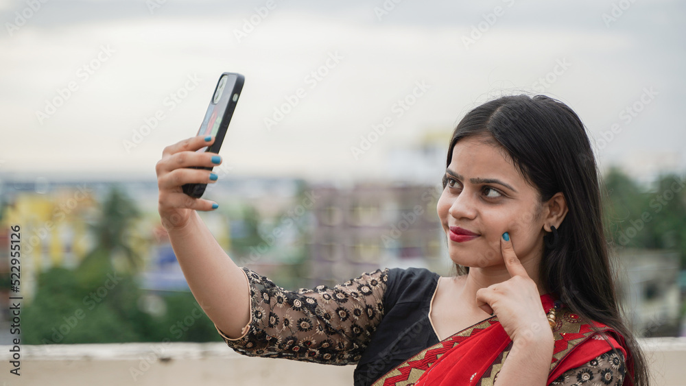 Beautiful Indian Girl Taking Selfie On Her Mobile Phone Outdoor Cheerful Asian Woman In 
