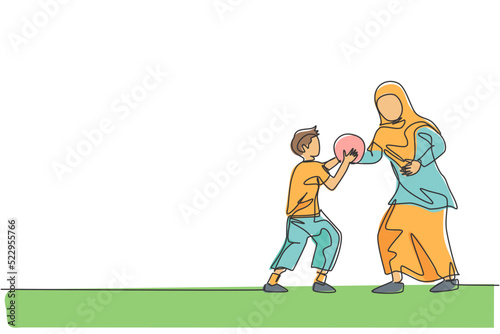 One single line drawing of young Islamic mother playing basketball sport with her son at public park vector illustration. Arabian muslim family parenting concept. Modern continuous line draw design