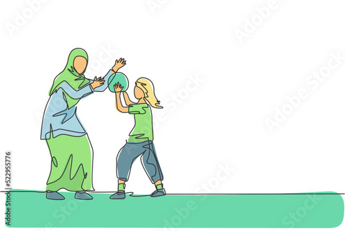 One continuous line drawing of young Islamic mom playing basketball with daughter at outfield park. Happy Arabian muslim parenting family concept. Dynamic single line draw design vector illustration