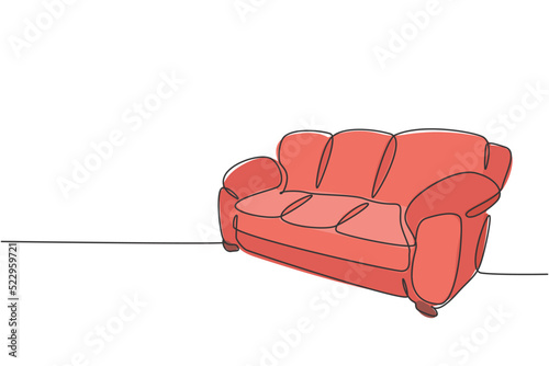 Single continuous line drawing of comfy luxury leather couch household utensil. Elegance sofa for living room home furniture concept. Modern one line draw design graphic vector illustration