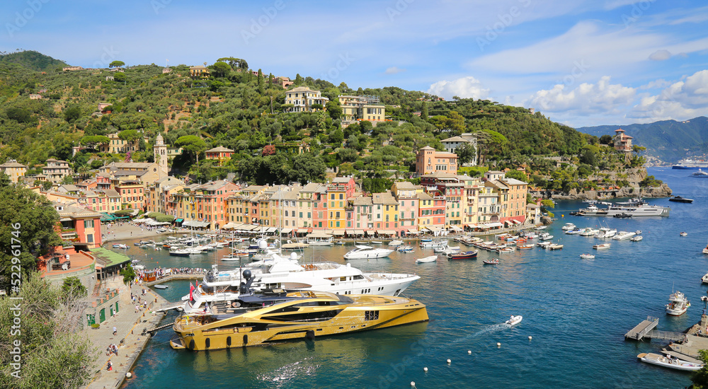 Colorful buildings and yachts in Marina di Portofino, Italy
