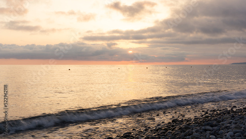 Amazing beach sunset over Black Sea. Lazarevskoye  Sochi  Russia