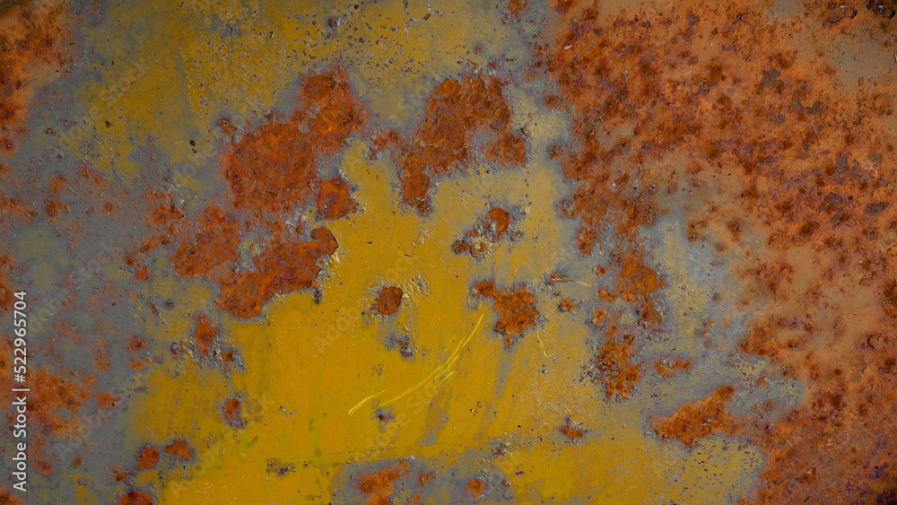 Abstract yellow colored peeling rusty metal steel aged weathered wall - Grunge rust aged background pattern