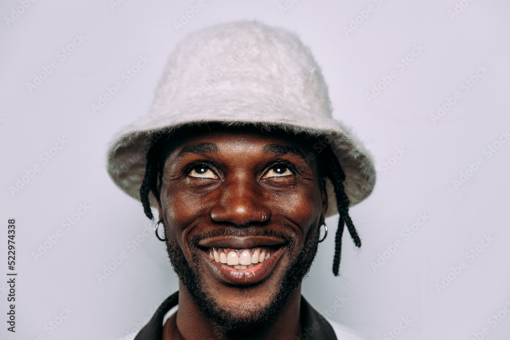 artistic portrait with gel lights. Handsome man posing on colored backgrounds. Artist singer performer posing for the album cover artistic portrait with gel lights. Handsome man posing on colored backgrounds. Artist singer performer posing for the album cover