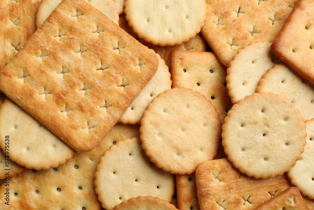 Many delicious crackers as background, top view Many delicious crackers as background, top view