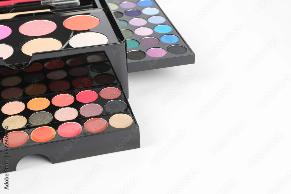 Large makeup case with different decorative cosmetics on white background Large makeup case with different decorative cosmetics on white background