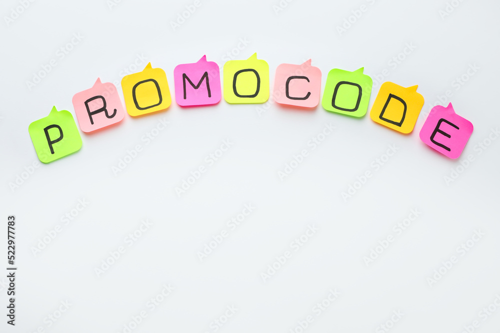 Sticky notes with words Promo Code on white background, flat lay. Space for text Sticky notes with words Promo Code on white background, flat lay. Space for text