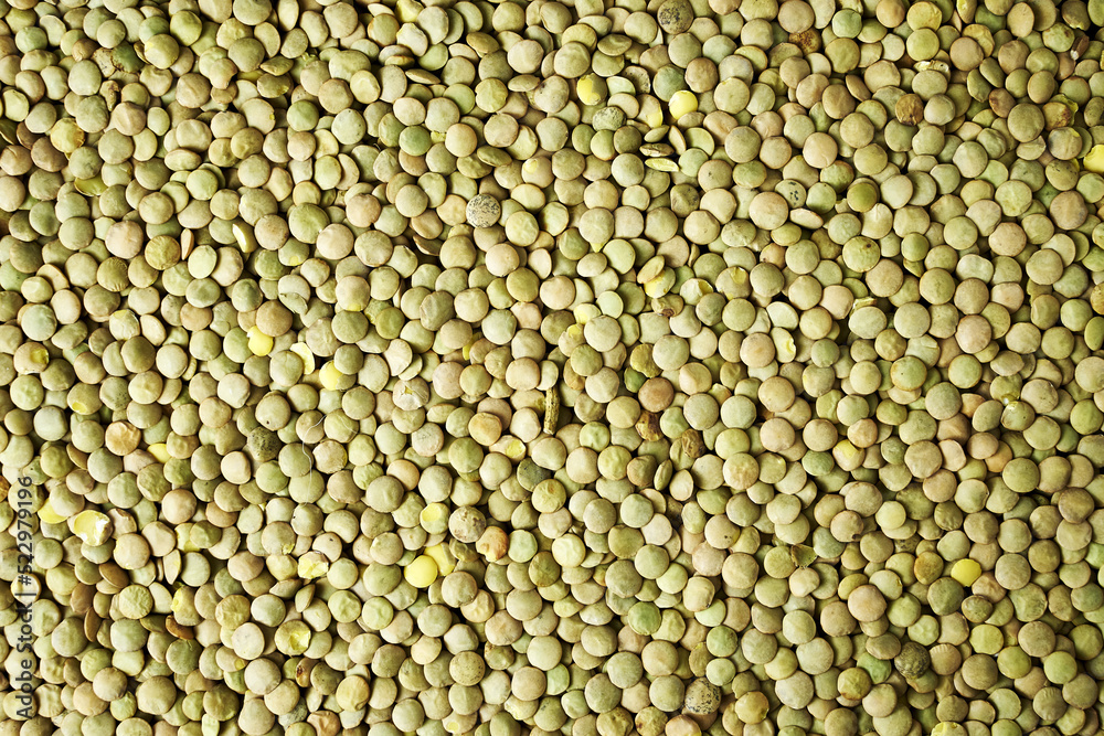screensaver in the background with lentil grains close-up