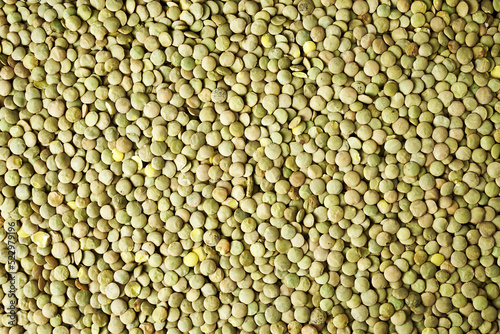 screensaver in the background with lentil grains close-up