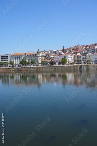 Scenery of Coimbra city and Mondego river in Portugal - vertical