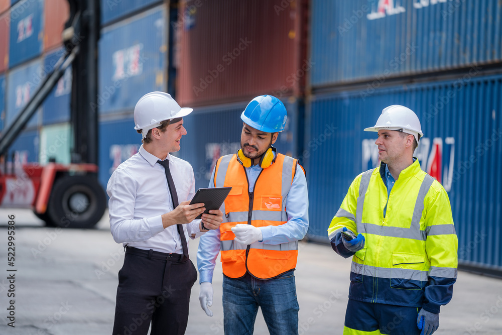 Engineer team planning the transportation of goods for import Or export in the container yard,Logistic shipping yard business,Imported product,Logistics. Engineer team planning the transportation of goods for import Or export in the container yard,Logistic shipping yard business,Imported product,Logistics.