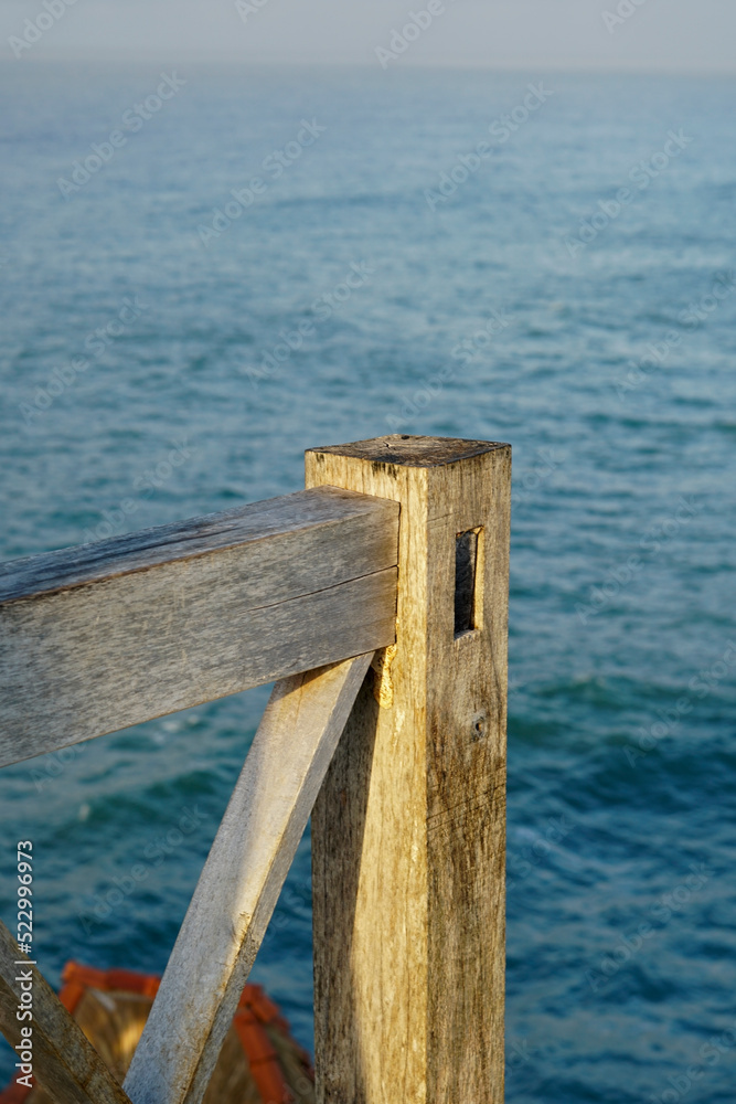 wooden terrace with view of Kasap beach in Pacitan, Est Java - Indonesia wooden terrace with view of Kasap beach in Pacitan, Est Java - Indonesia