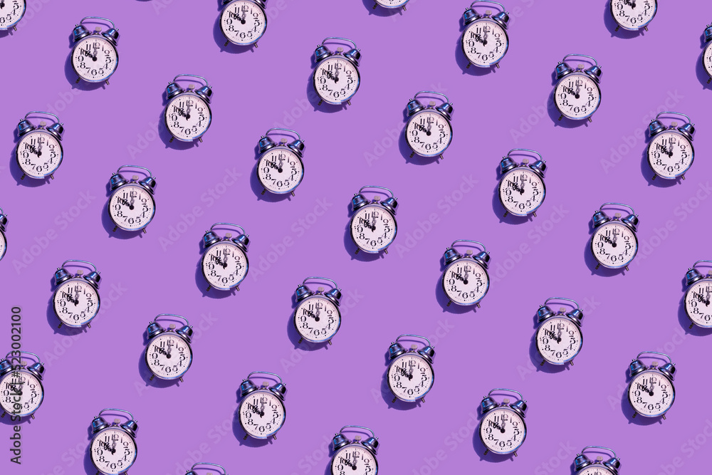 seamless pattern with alarm clock, lilac background