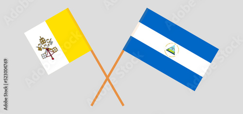 Crossed flags of Vatican and Nicaragua. Official colors. Correct proportion