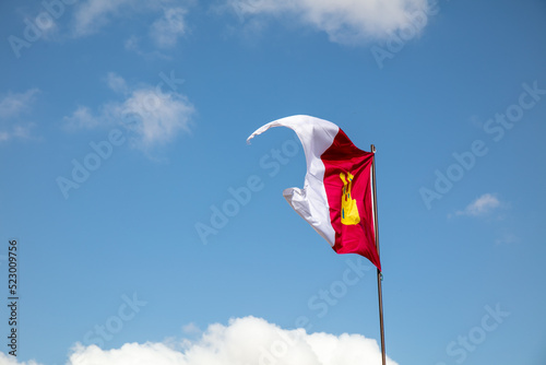 Albacete province Flag rise in. blue sky . red and white photo