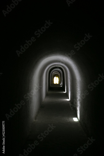 Tunnel in the darkness with lights. Alcala del Jucar. Albacete
