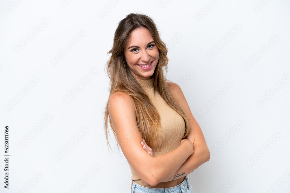 Young caucasian woman isolated on white background with arms crossed and looking forward Young caucasian woman isolated on white background with arms crossed and looking forward
