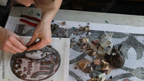 Materials sketch and tools for making colored smalt glass mosaics. Master class making mosaic woman ancient greek portrait.