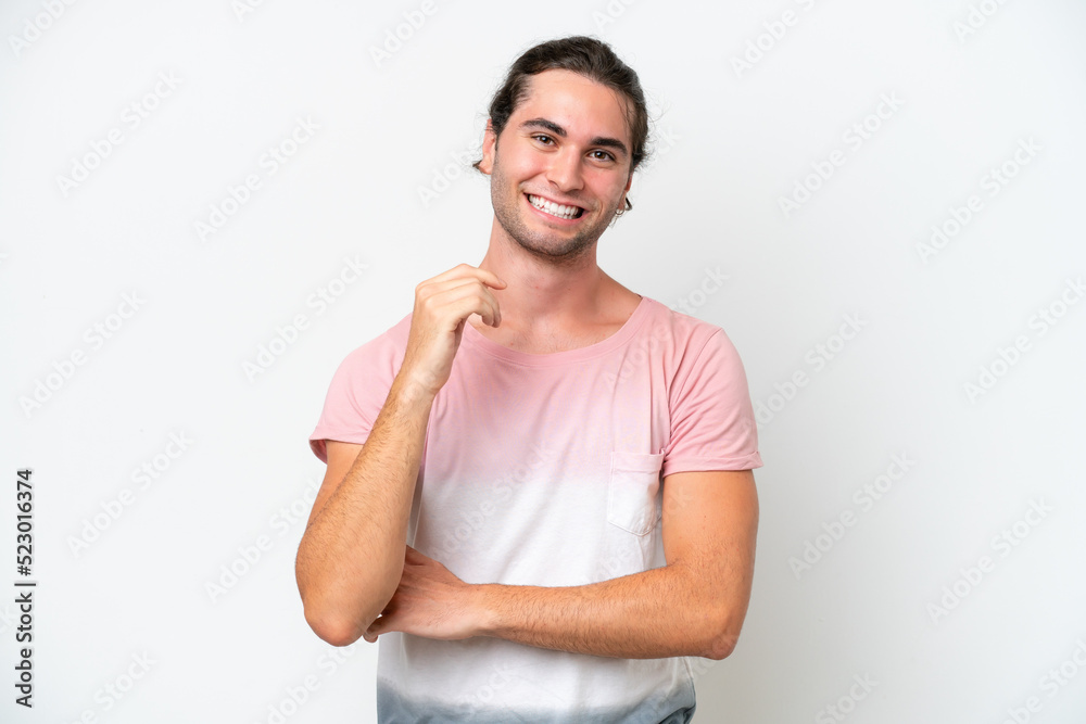 Fototapeta premium Caucasian handsome man isolated on white background laughing