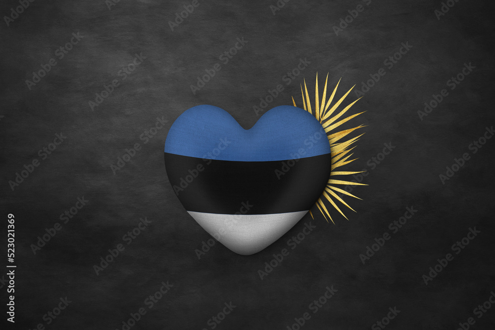 Textile heart in colors of national flag. Photography and marketing digital backdrop. Estonia
