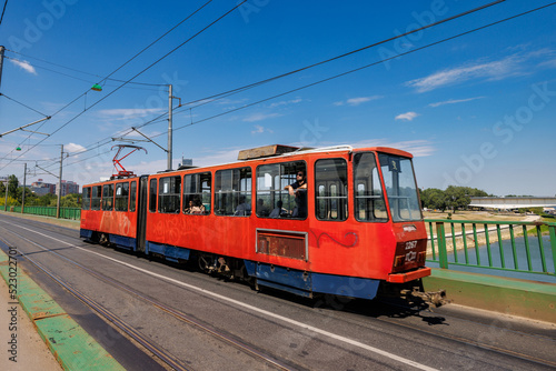 A tram rides across the Stari Savski, the Old Sava Bridge in Belgrade, Serbia