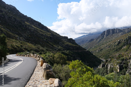 New tarmic road leading through Bainskloof Pass Mountains in Western Cape, South Africa photo