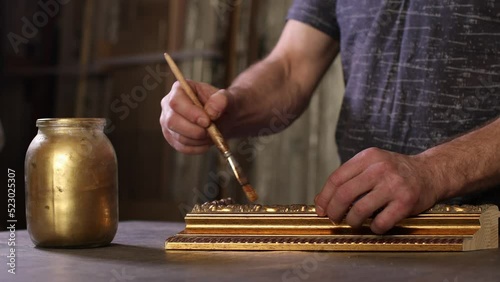 Framing Workshop. Painting baguette handmade picture frame at studio.