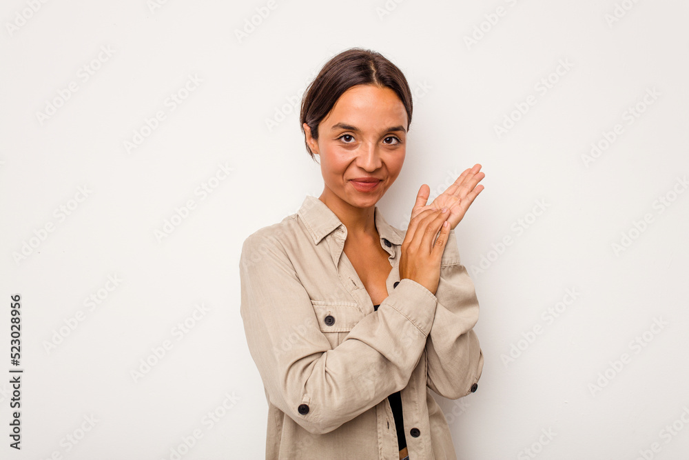 Young hispanic woman isolated on white background feeling energetic and comfortable, rubbing hands confident. Young hispanic woman isolated on white background feeling energetic and comfortable, rubbing hands confident.