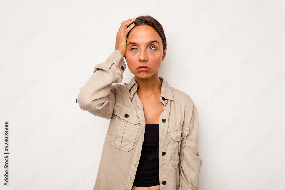 Young hispanic woman isolated on white background tired and very sleepy keeping hand on head. Young hispanic woman isolated on white background tired and very sleepy keeping hand on head.