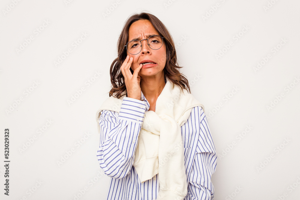Young hispanic woman isolated on white background tired and very sleepy keeping hand on head. Young hispanic woman isolated on white background tired and very sleepy keeping hand on head.