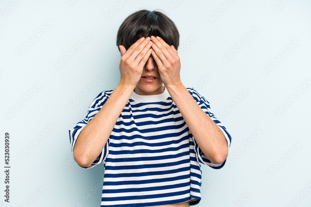Young caucasian woman with a short hair cut isolated afraid covering eyes with hands.
