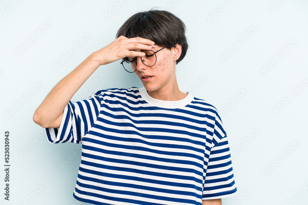 Young caucasian woman with a short hair cut isolated having a head ache, touching front of the face. Young caucasian woman with a short hair cut isolated having a head ache, touching front of the face.