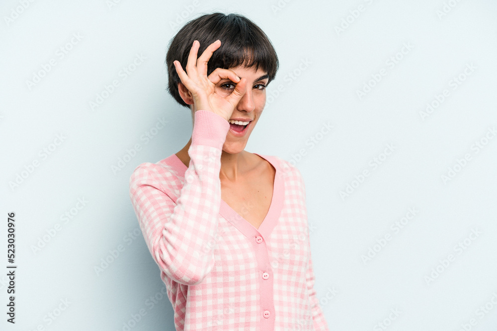 Young caucasian woman with a short hair cut isolated excited keeping ok gesture on eye. Young caucasian woman with a short hair cut isolated excited keeping ok gesture on eye.