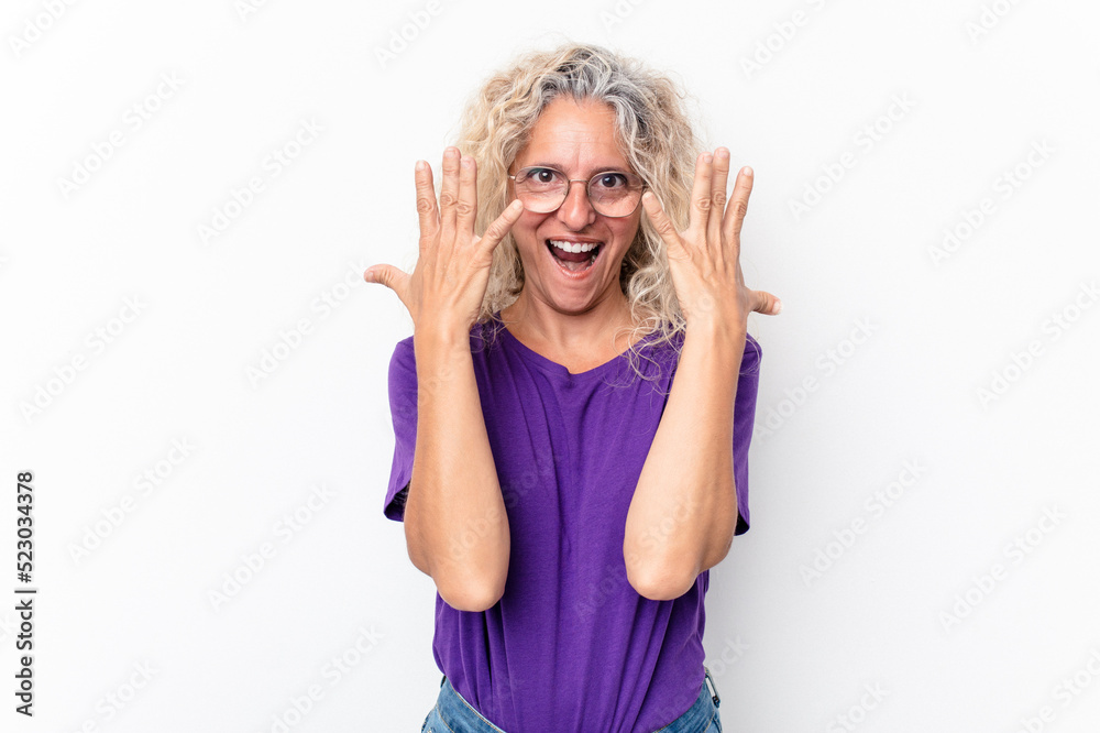 Middle age caucasian woman isolated on white background showing number ten with hands. Middle age caucasian woman isolated on white background showing number ten with hands.