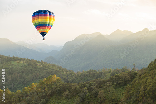 Hot air balloon over the mountain © littlestocker