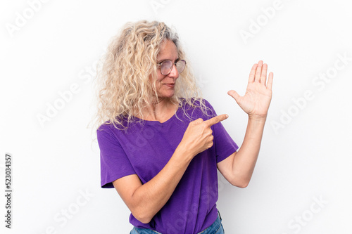 Middle age caucasian woman isolated on white background smiling cheerful showing number five with fingers.