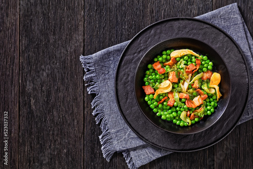 petits pois, french dish of garden green peas photo