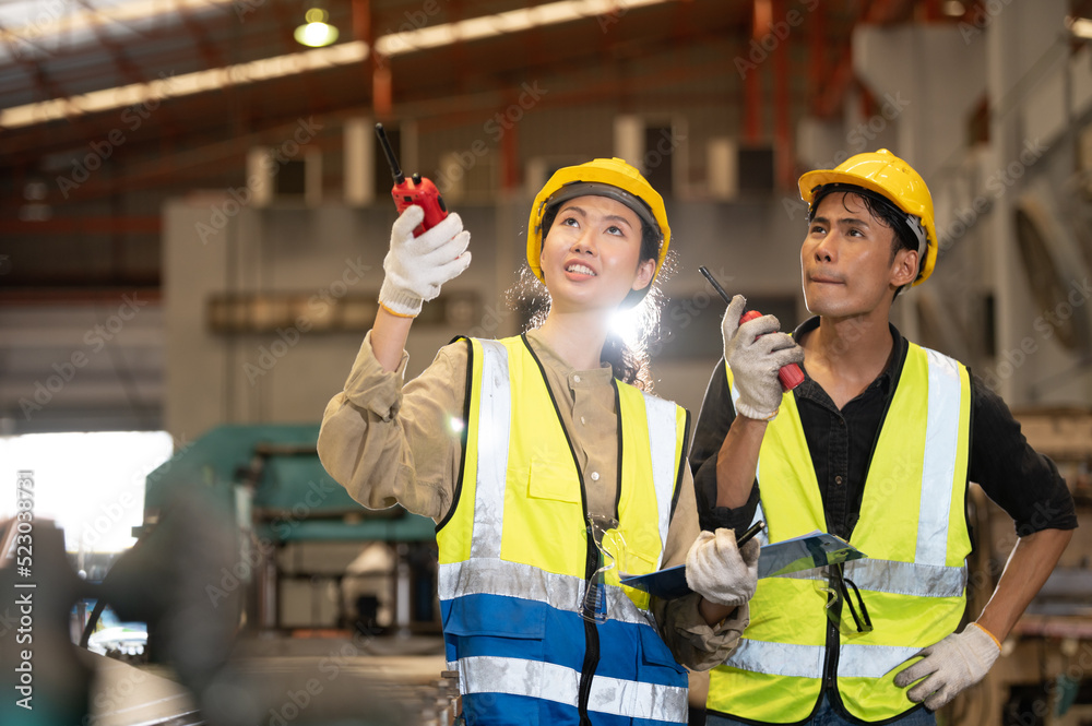 Team Asian engineer working control machine in factory. Group people Asia Worker control machine with manufacturing of industry. Team Asian engineer working control machine in factory. Group people Asia Worker control machine with manufacturing of industry.