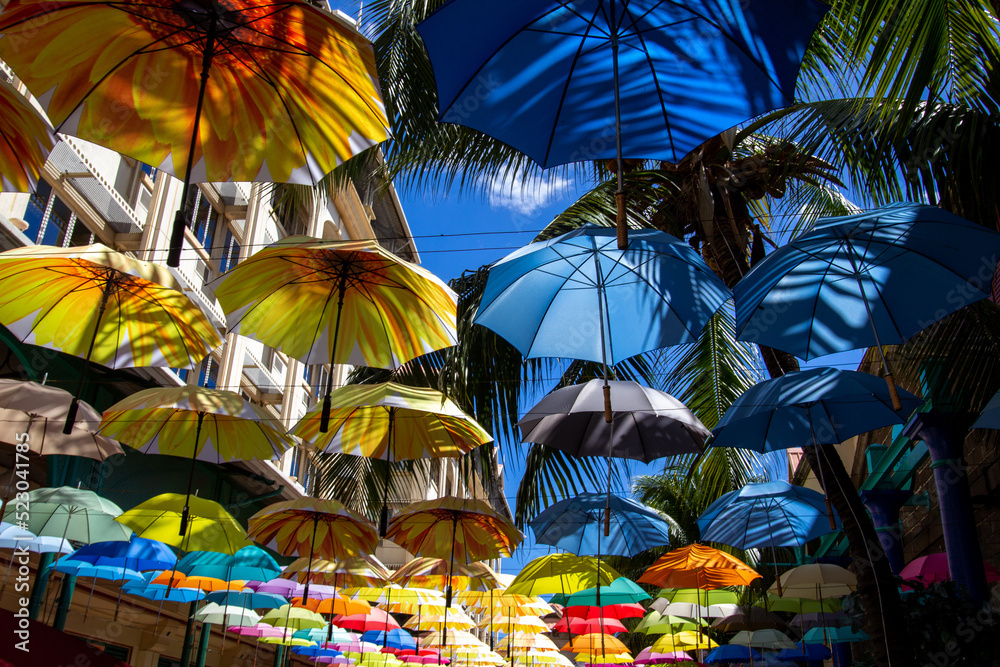 Obraz premium colorful umbrellas at the market