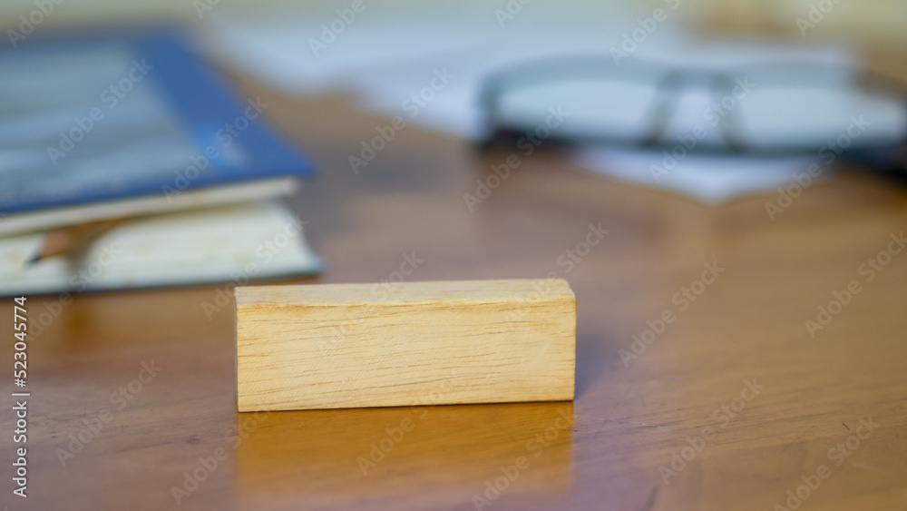wooden block on wood table background planning in business model