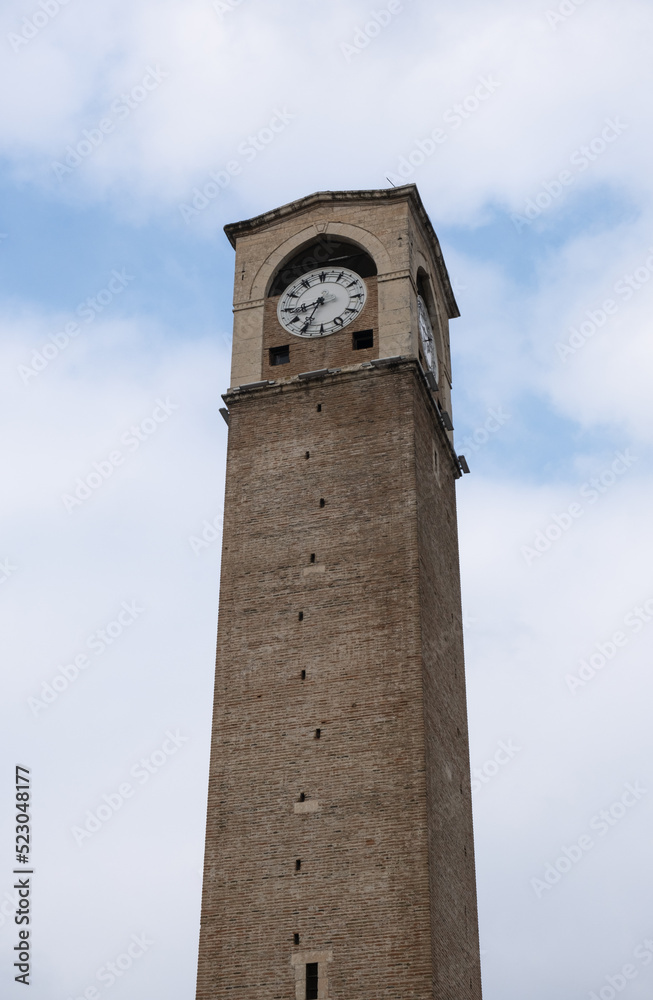 historical clock tower and cloudy weather in background. buyuk saat. adana, turkey. 