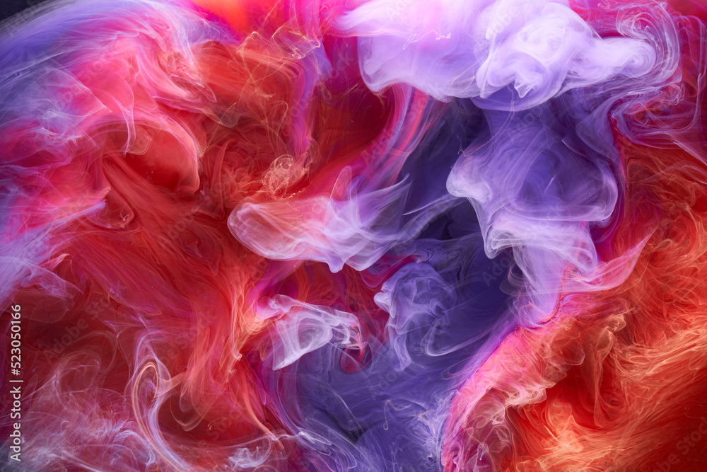 Blue red colorful smoke abstract background, acrylic paint underwater explosion