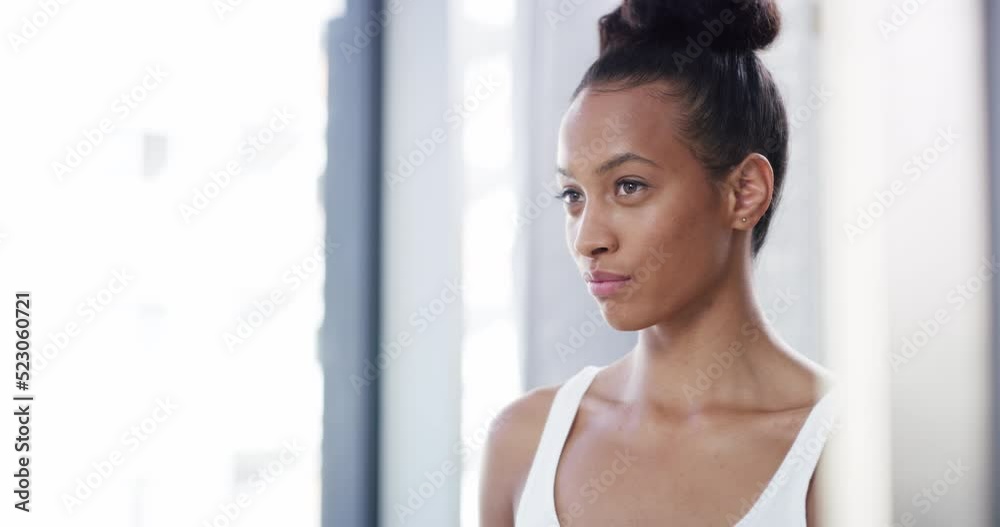 Beauty, skincare and face routine while a serious woman look in the bathroom mirror and feeling confident about her beautiful, healthy and clean skin. A young woman looking fresh after selfcare Beauty, skincare and face routine while a serious woman look in the bathroom mirror and feeling confident about her beautiful, healthy and clean skin. A young woman looking fresh after selfcare