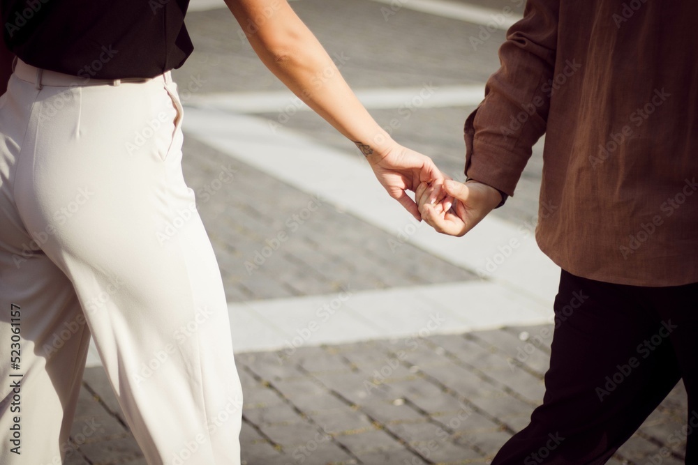 couple holding hands couple holding hands