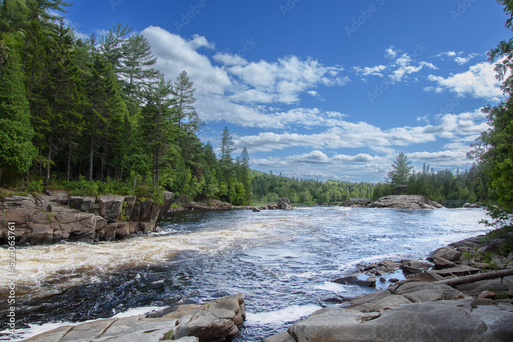 Waterfalls on a beautiful wild river in Quebec in Canada Waterfalls on a beautiful wild river in Quebec in Canada